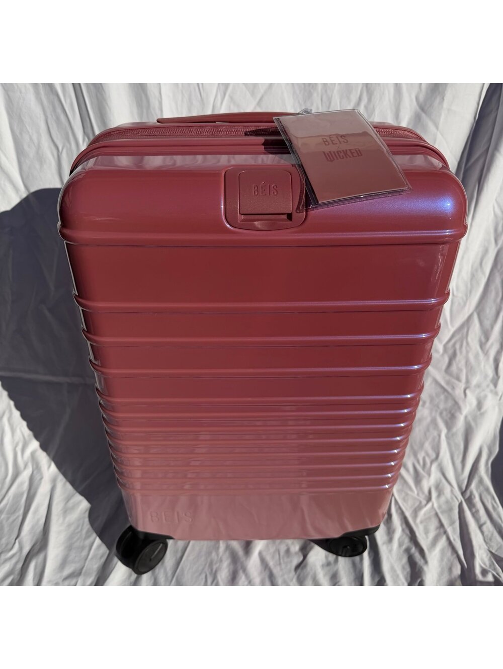 Beis the Carry-On Roller in Wicked Pink